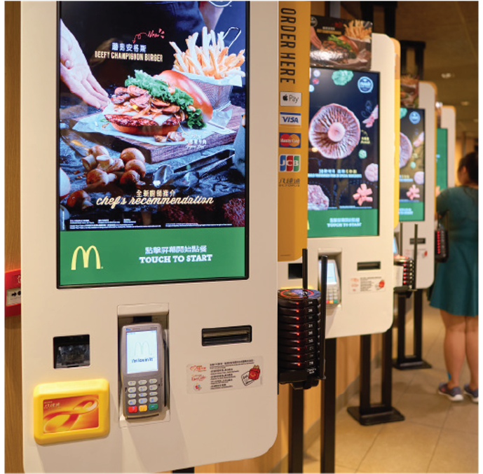 Self service screens at a fast food restaurant